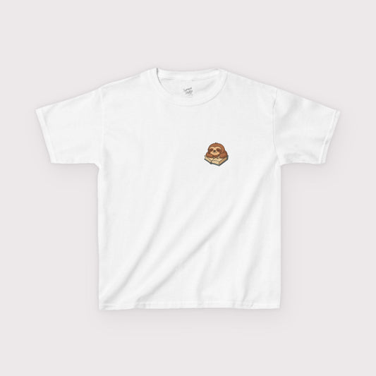 White t-shirt with a small graphic on a light gray background
